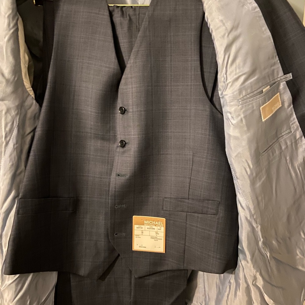 Three piece Brand new Michael Kors suit from Macy’s.